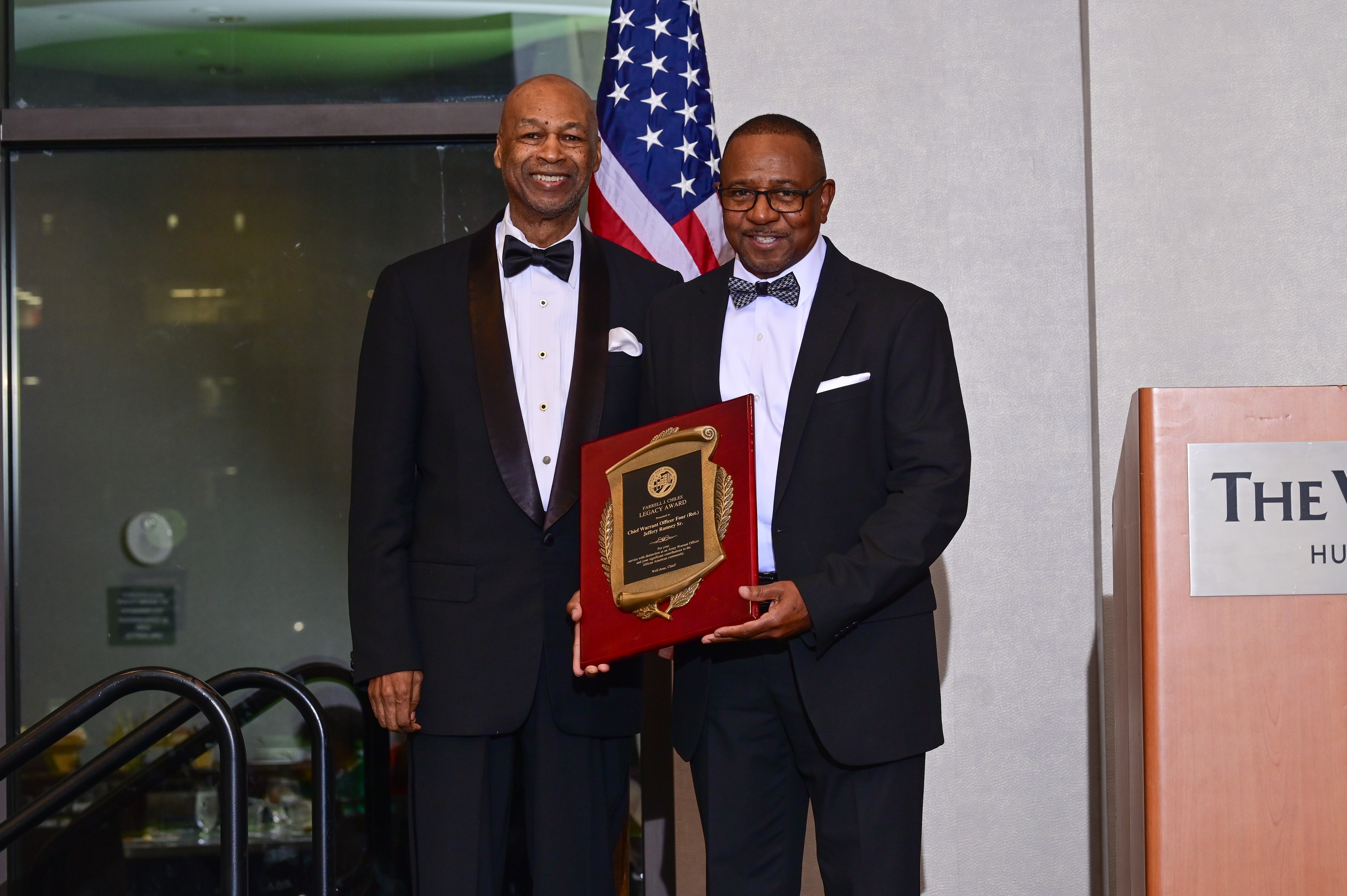 Close view of a crystal award being presented on velvet